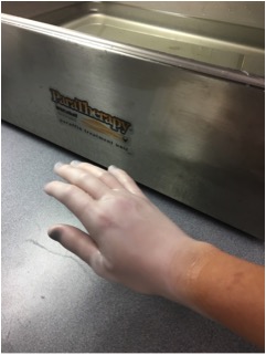 Picture of hand that has just been dipped in Paraffin Wax